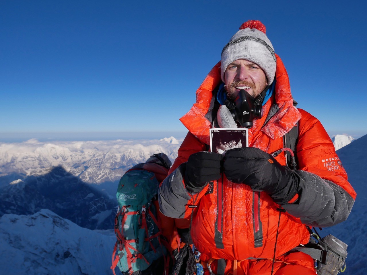 Mountaineer stood on Everest with sonogram